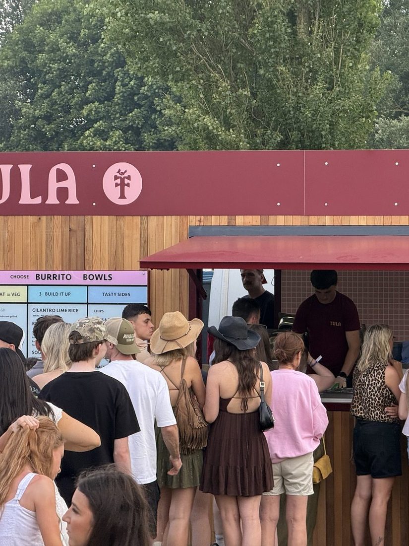 A long queue at the Tula Mexican Grill trailer at a festival
